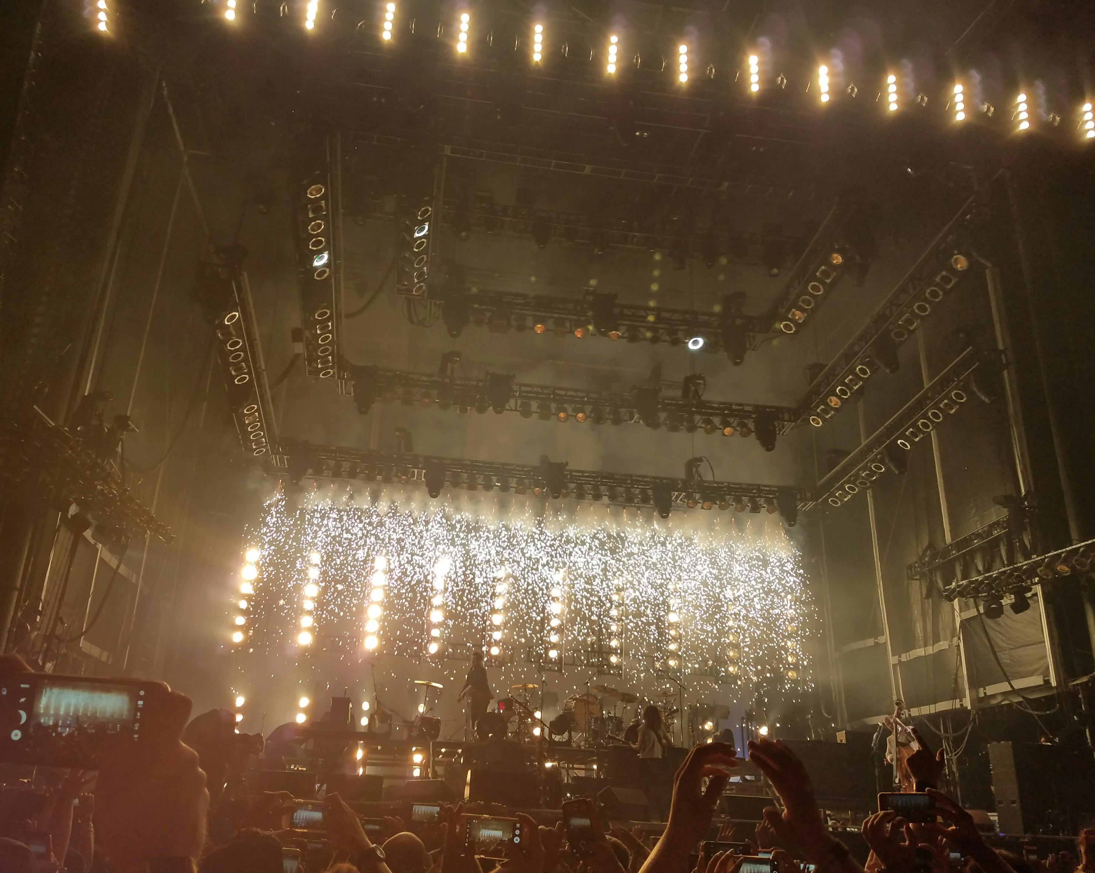 people-inside-building-with-lights-watching-concert