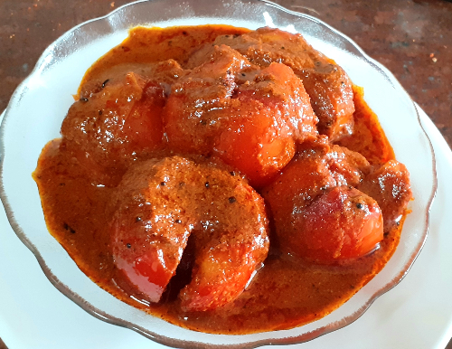 Stuffed tomato  curry