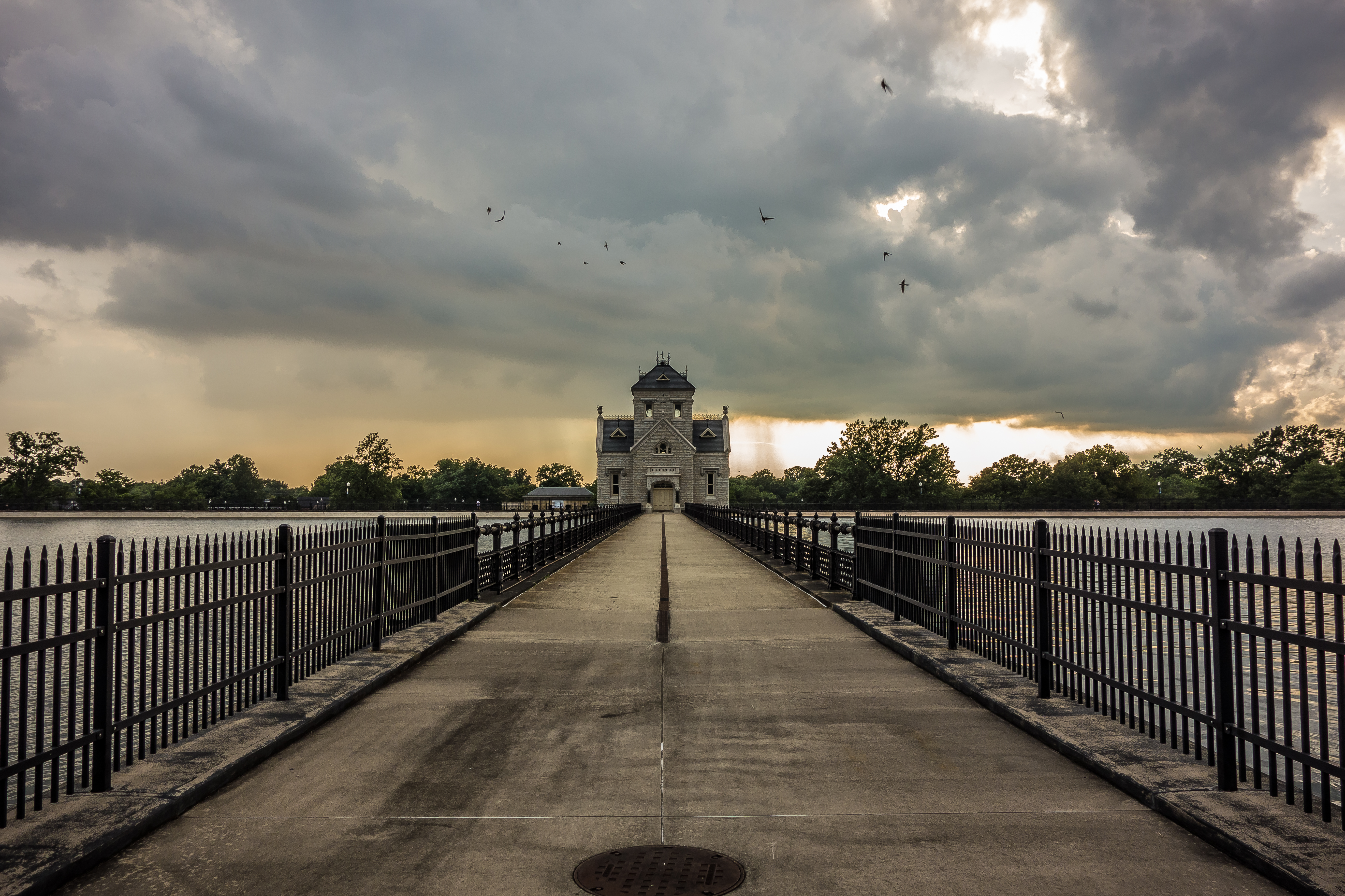 reservoir at sunset before storm