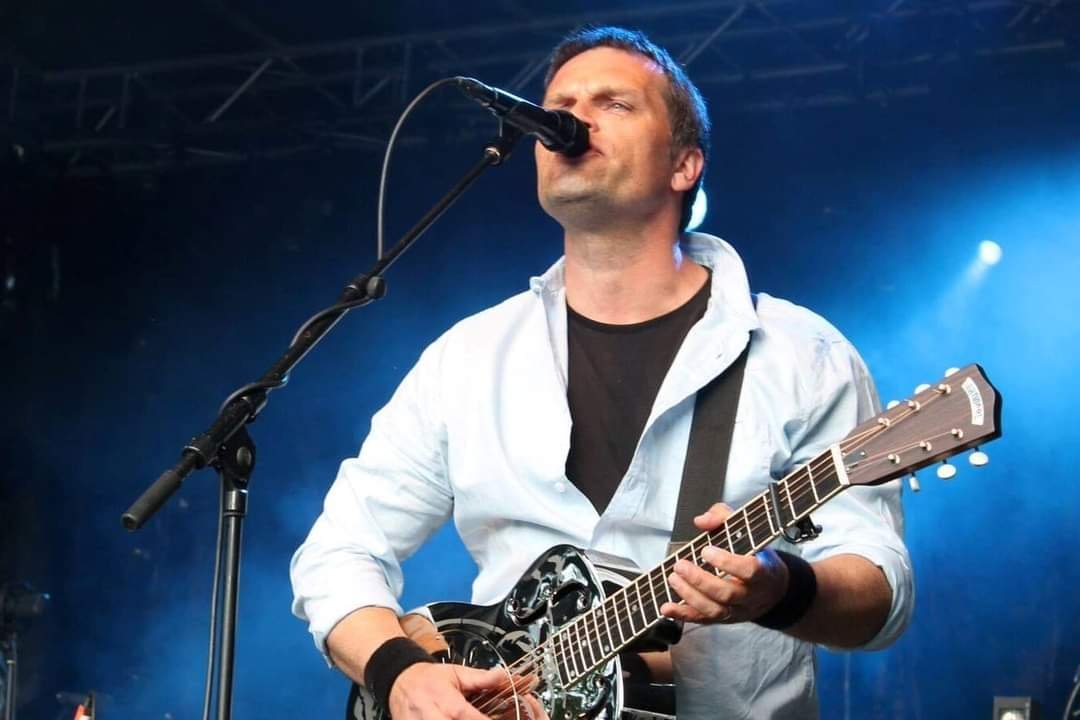 May be an image of guitar