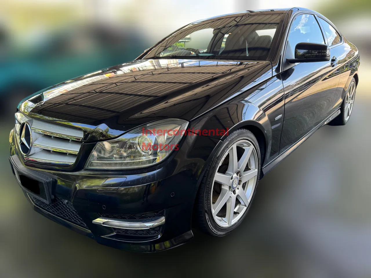 Front view of 2011 Mercedes-Benz C180 1.8 CGi AMG Coupe (A)