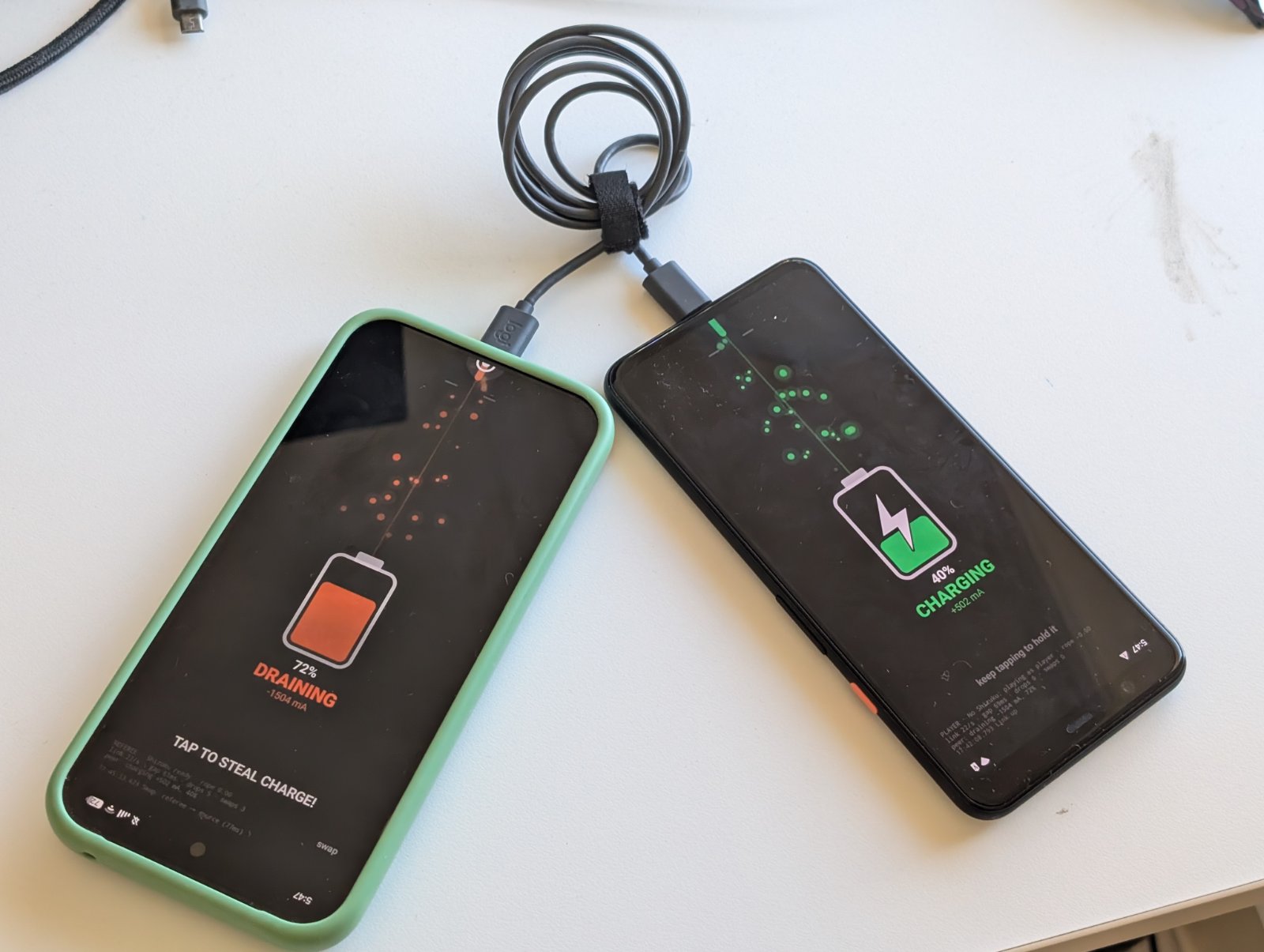 The winner drains battery power from the opponent