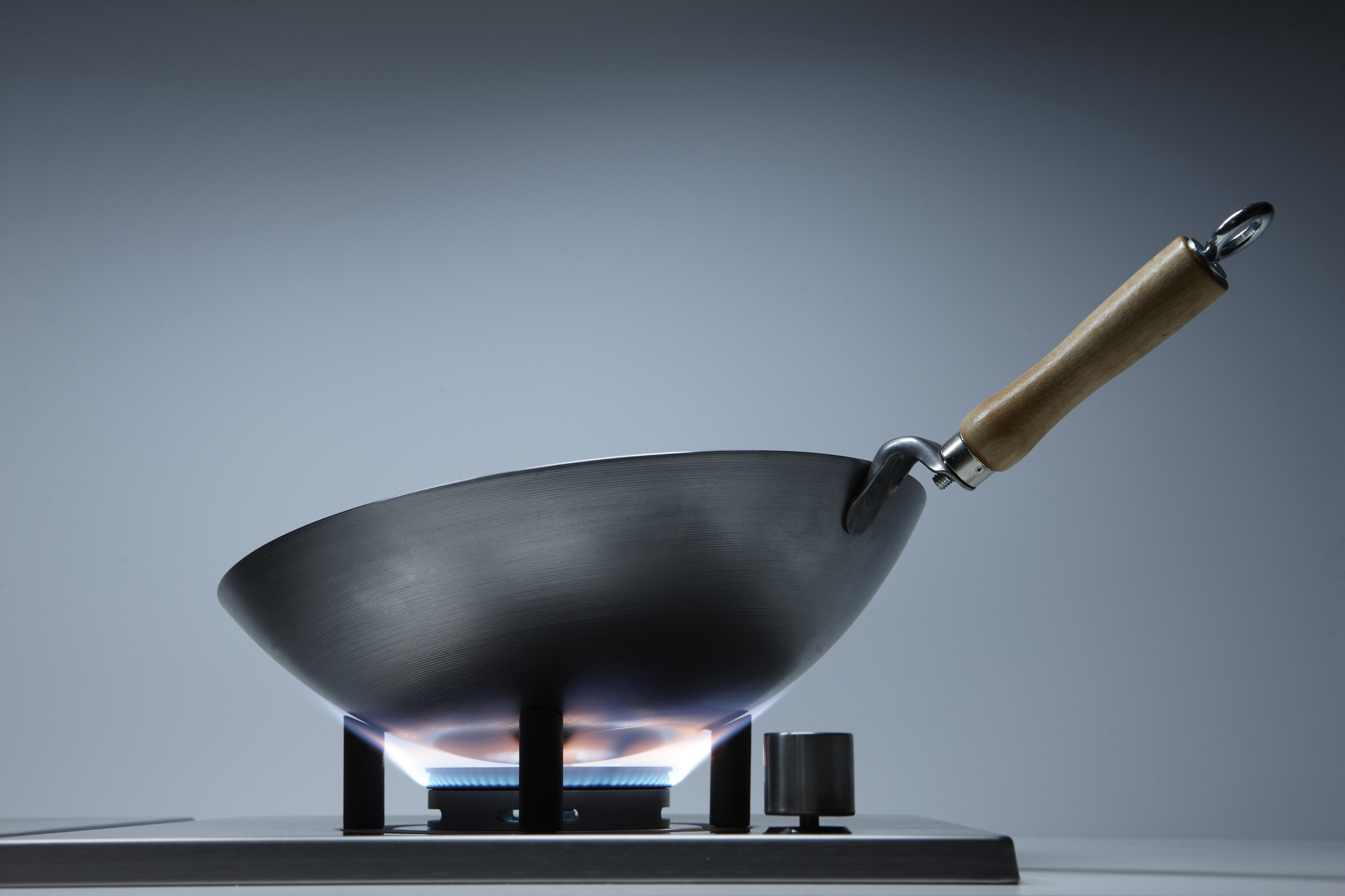 A cook top designed for a wok
