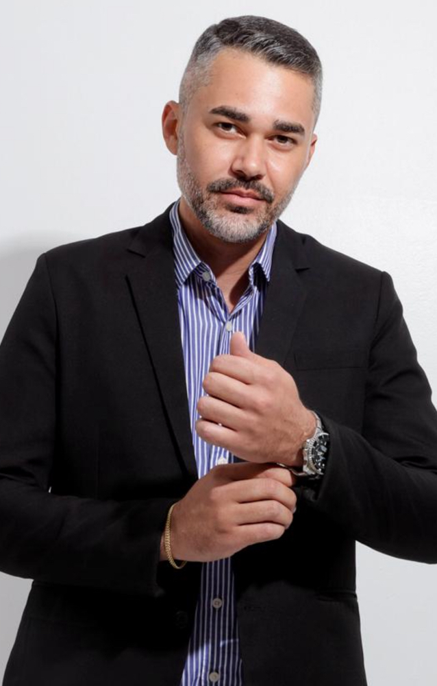 Corretor Roberto Dias