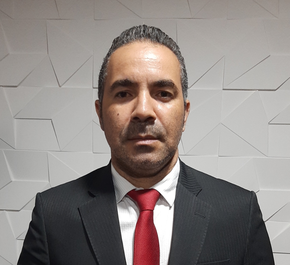 Corretor Andre Carlos
