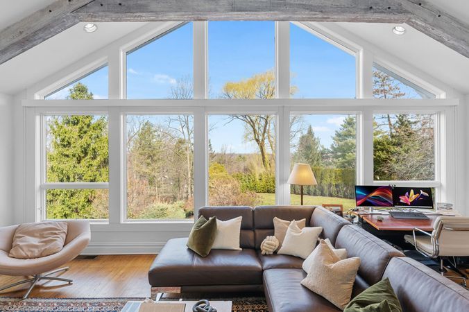 Floor to Ceiling Windows Overlooking Mountains