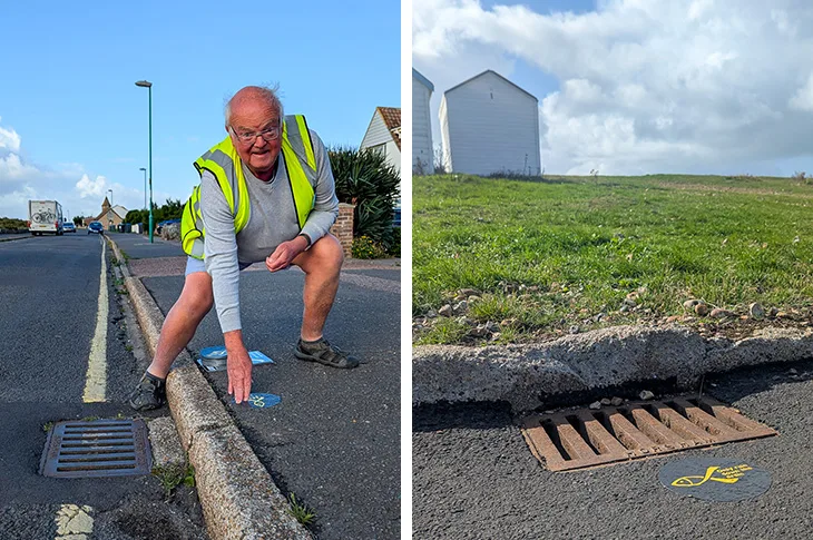Cllr Andy Harvey placing one of the yellow fish stickers by a drain