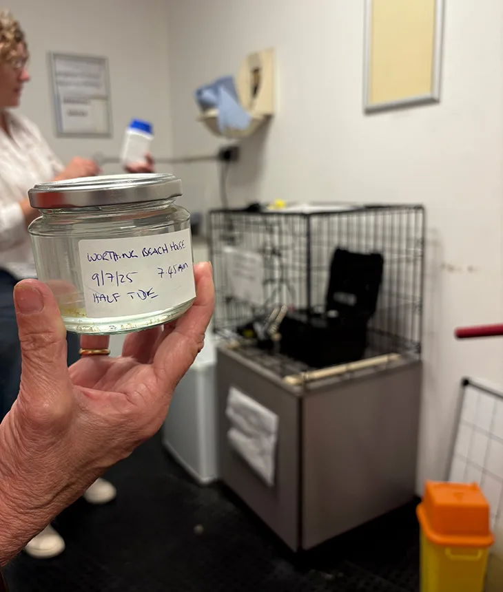 The seawater sample being delivered to the testing facility at the King Alfred Leisure Centre in Hove