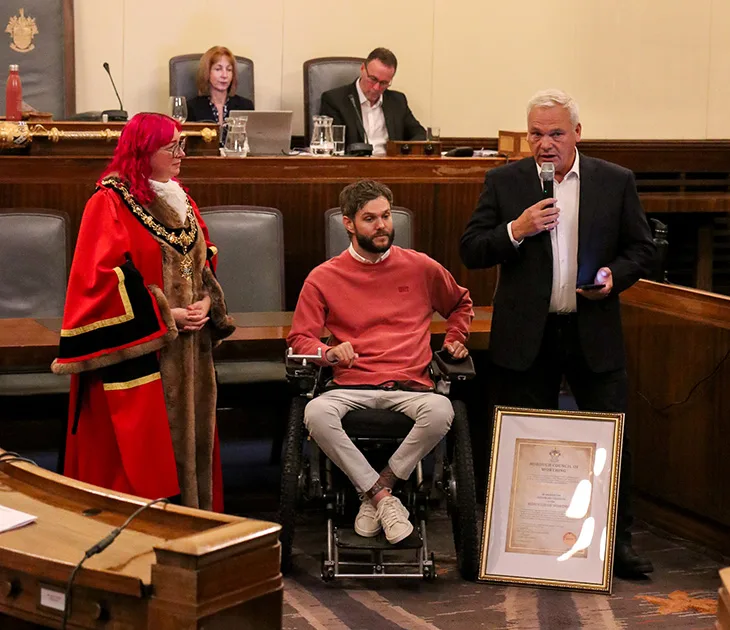 Barry Hunter, chairman of Worthing Football Club, speaking at the special council meeting