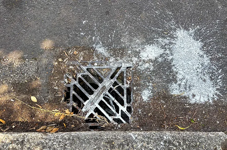 A drain in Worthing that has had liquid waste poured down it
