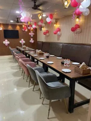 Restaurant table and chairs available for sale.