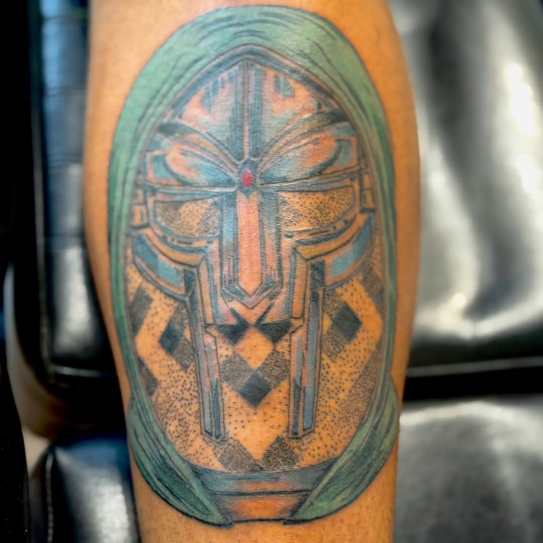 A rad client who I was tattooing started talking to me about wanting an MF DOOM tattoo and also mentioned wanting some of my Ojo De Dios geometry (YEA