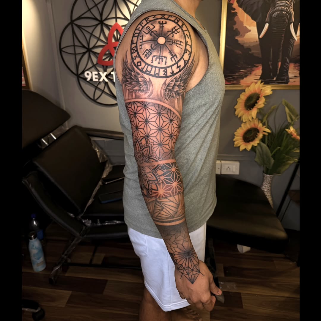 Direction on the shoulder, balance through geometry, strength in every line.

This custom full-sleeve tattoo is a journey — not just a design.

Crafte