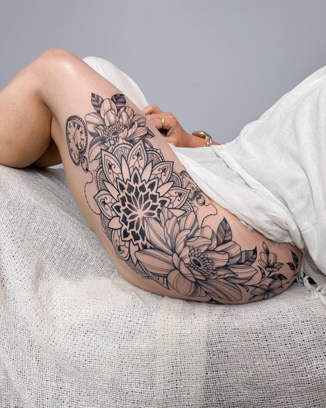 Lovely mandala and floral piece on the thigh
