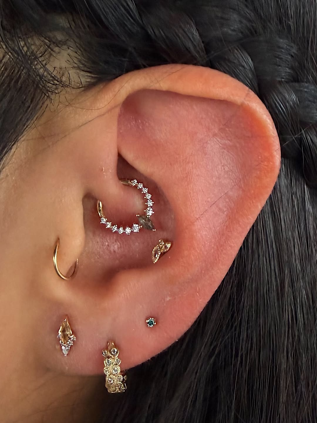 Our client came in this week and knew exactly what she wanted, color gemstones and gold! All piercings are 6 years healed, done by @finegoldbodyjewelr