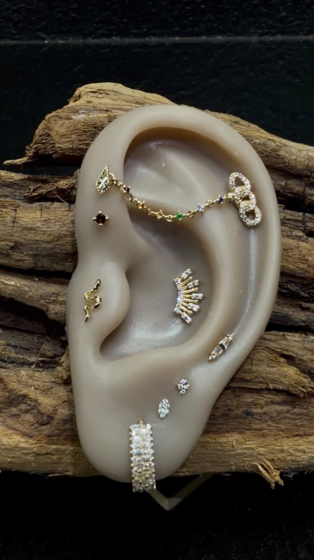 Coachella day 3, inspired by miss Carol G! This Yellow Gold curation with pops of Red garnet, citrine, blue sapphire, genuine diamonds, for this Colom