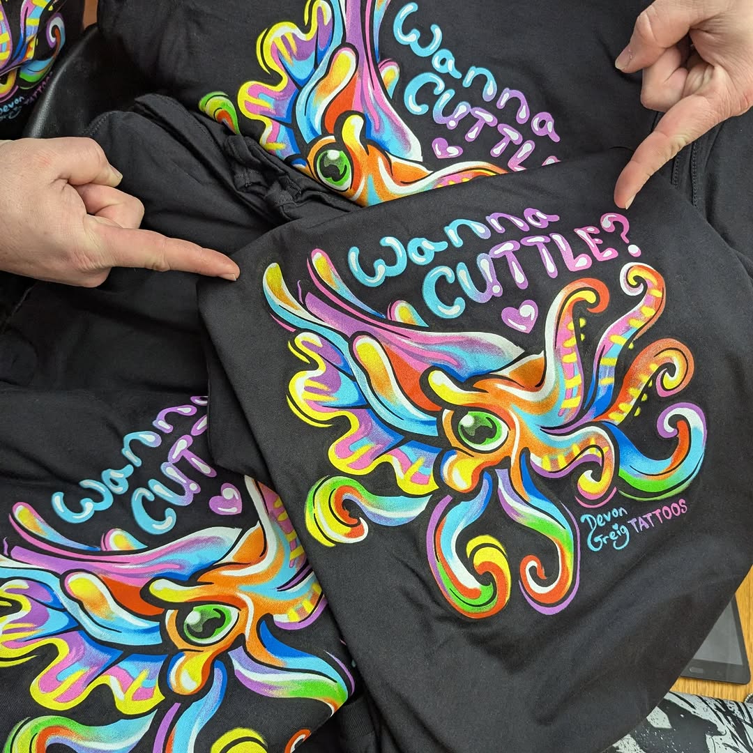 WANNA CUTTLE? T-shirts and tank tops are here!! They'll be available THIS WEEKEND at @memphistattoofestival Snag one before they run out!