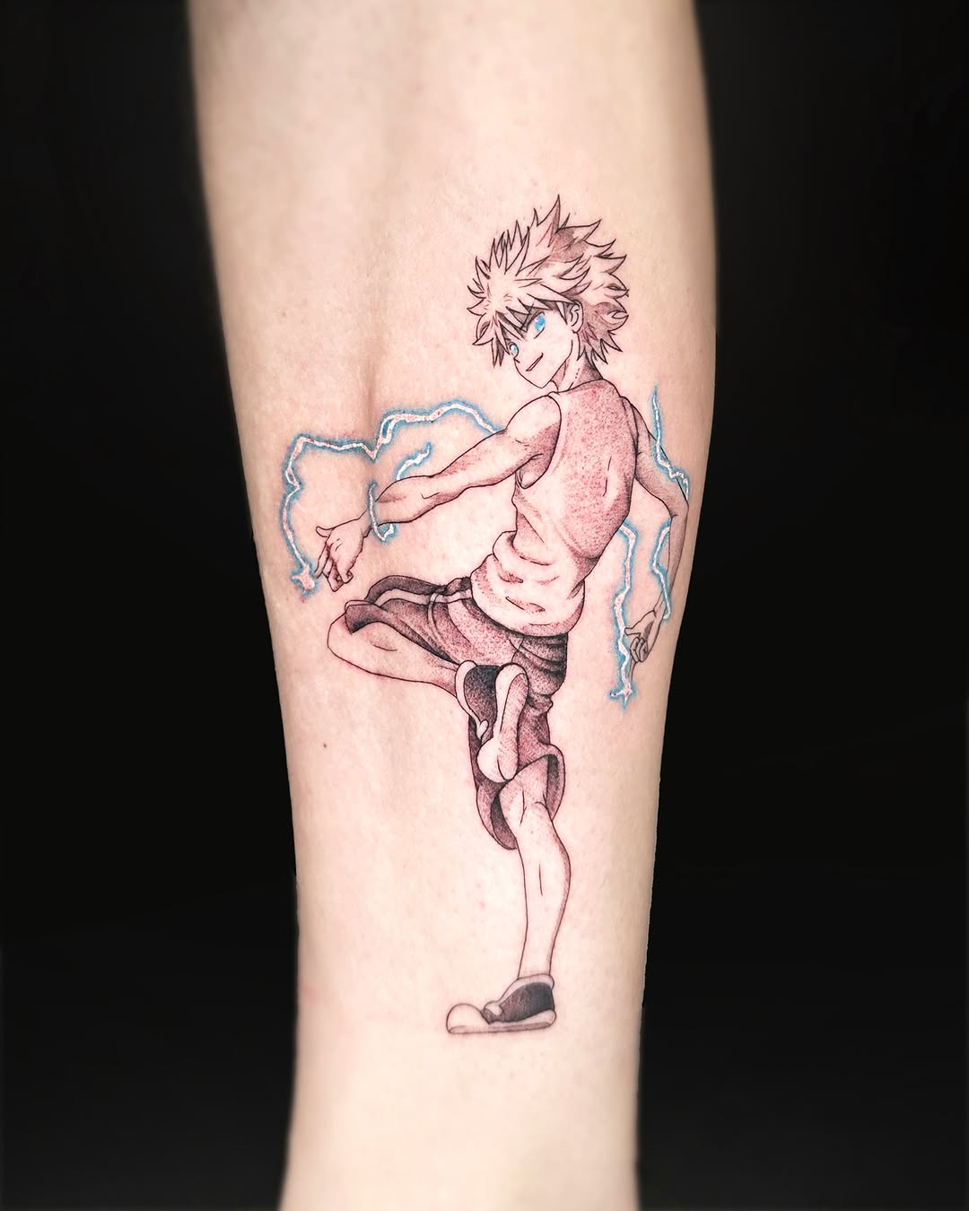 Black & grey Killua by Ice. Fine line detailing with soft whip shading and selective color accents to define energy and movement.  DM to book.

#tatto