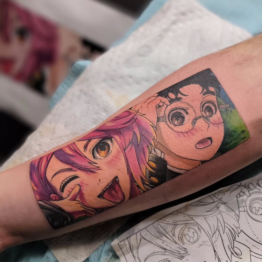 First tattoo EVER + we went full manga panel mode 
My client came in wanting a Dandadan-inspired piece featuring two of his favorite characters, and w
