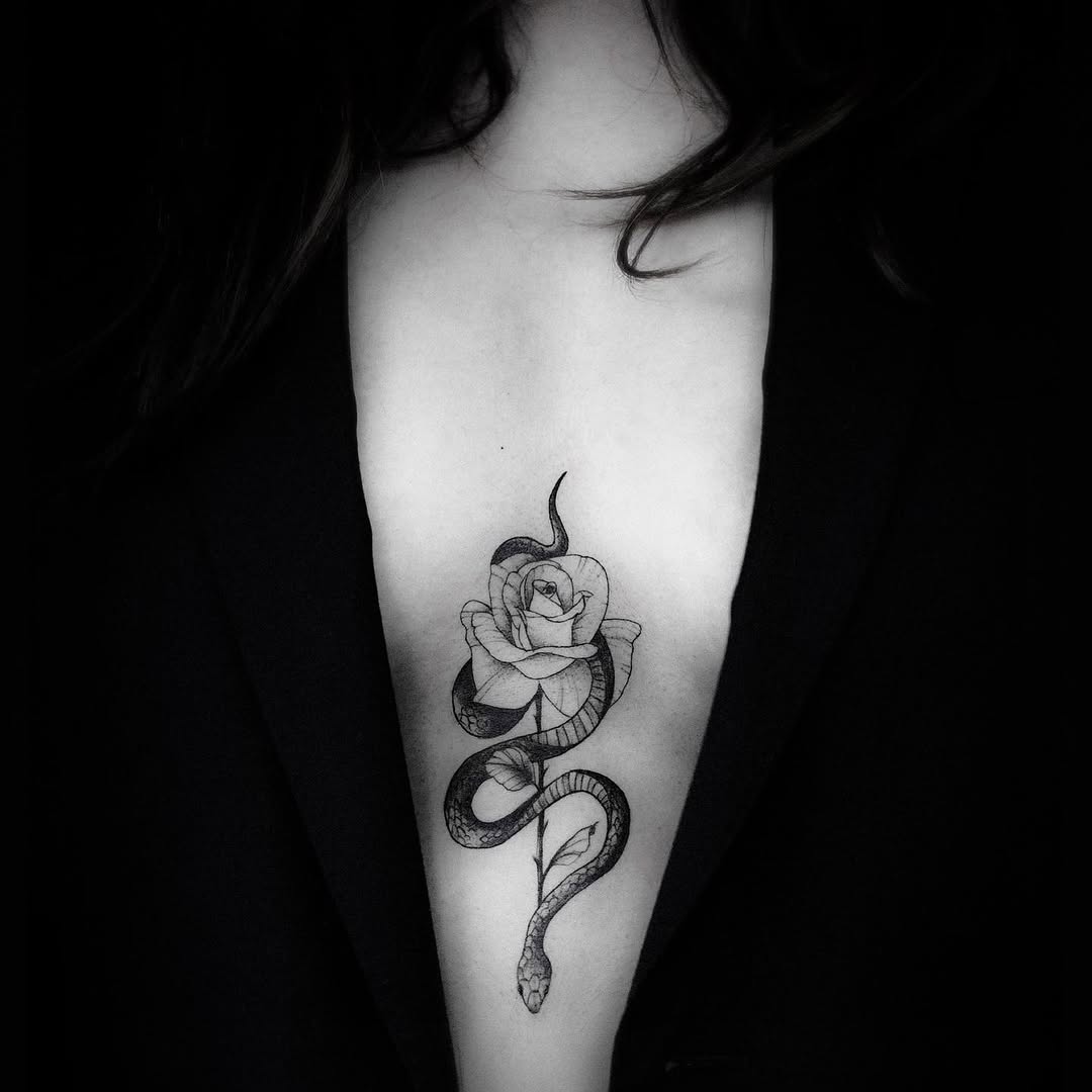 The symbol of love and temptation for Cheryl makes me want to get a sternum tattoo so bad..should I? 
.
.
.
#snaketattoo #fineline #rosetattoo #tattoo