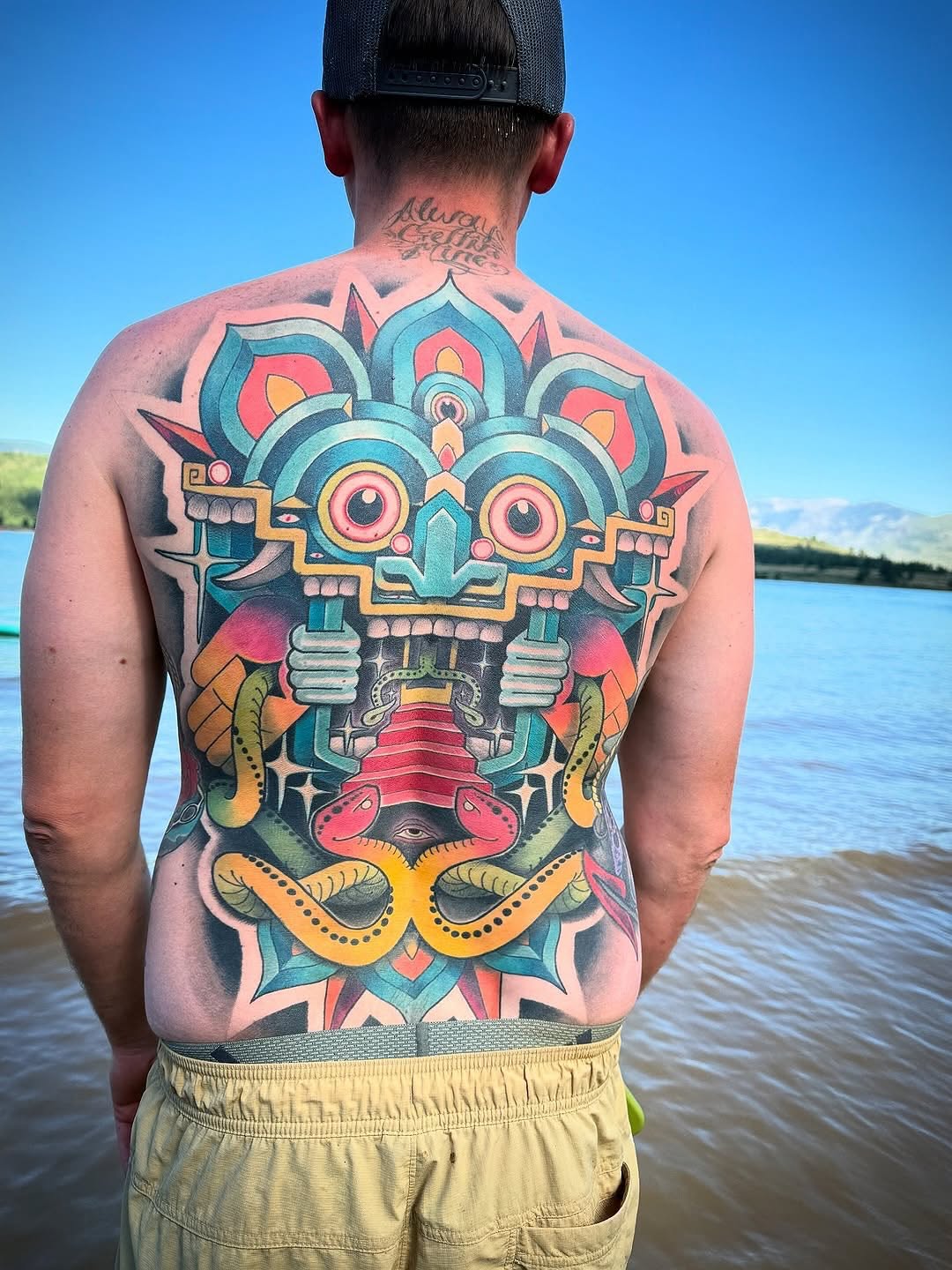 Healed vs. Fresh Snake Face Back tattoo by @anthony_ortega_tattoos in Reno, Nevada.