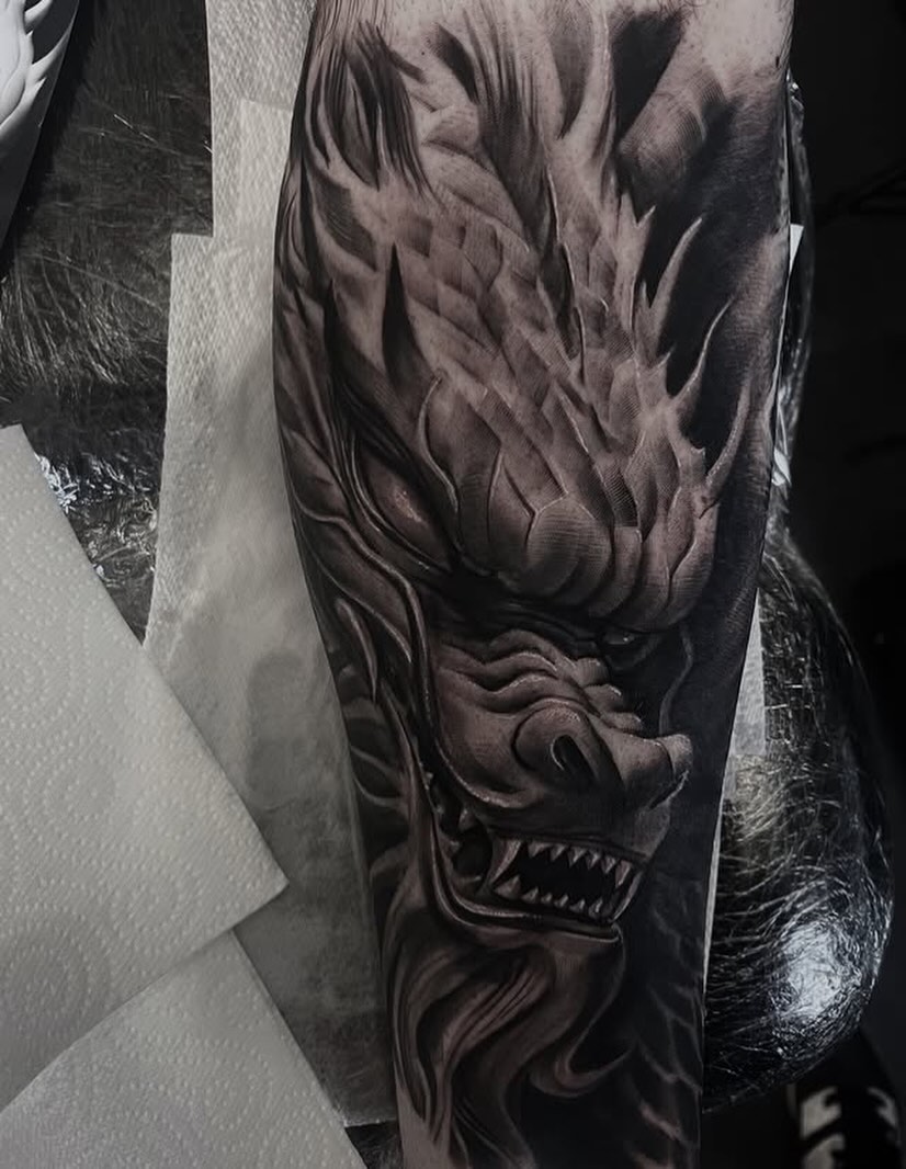 Black and grey realism dragon by Dawid 