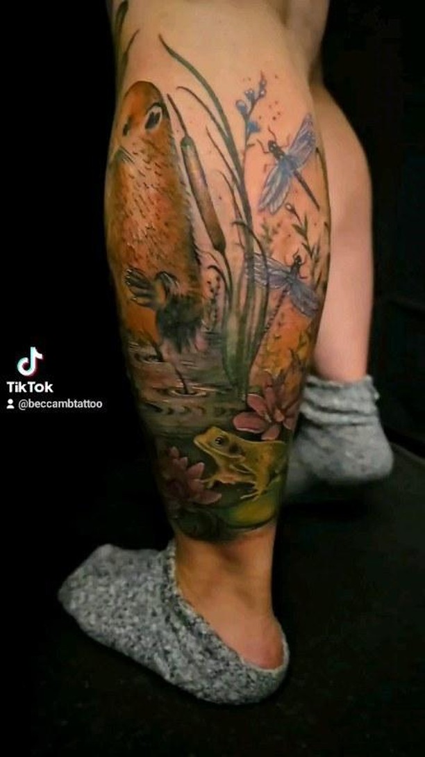 added more to the lovely Leahs #legsleevetattoo #inprogress with this #frog and #waterlily #tattoos , some #dragonflies , to this #ottertattoo and #ro