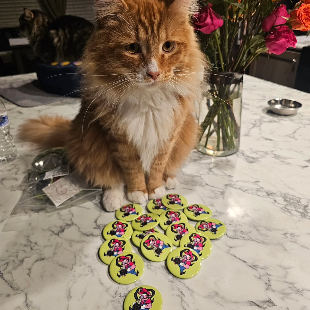MELTED Wario pins just came in and they are approved by my favorite gato, Vito here!!! I'll be selling these and giving them away for FREE to clients 