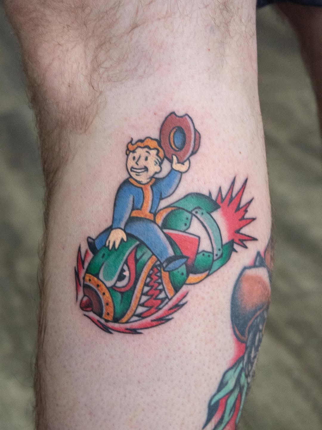 American traditional style Fallout tattoo! 
Artist: @dylan.s.ink 
.
.
.
.
.
.
#americantraditionaltattoo #fallout #colourtattoo #tattooartist #blackth