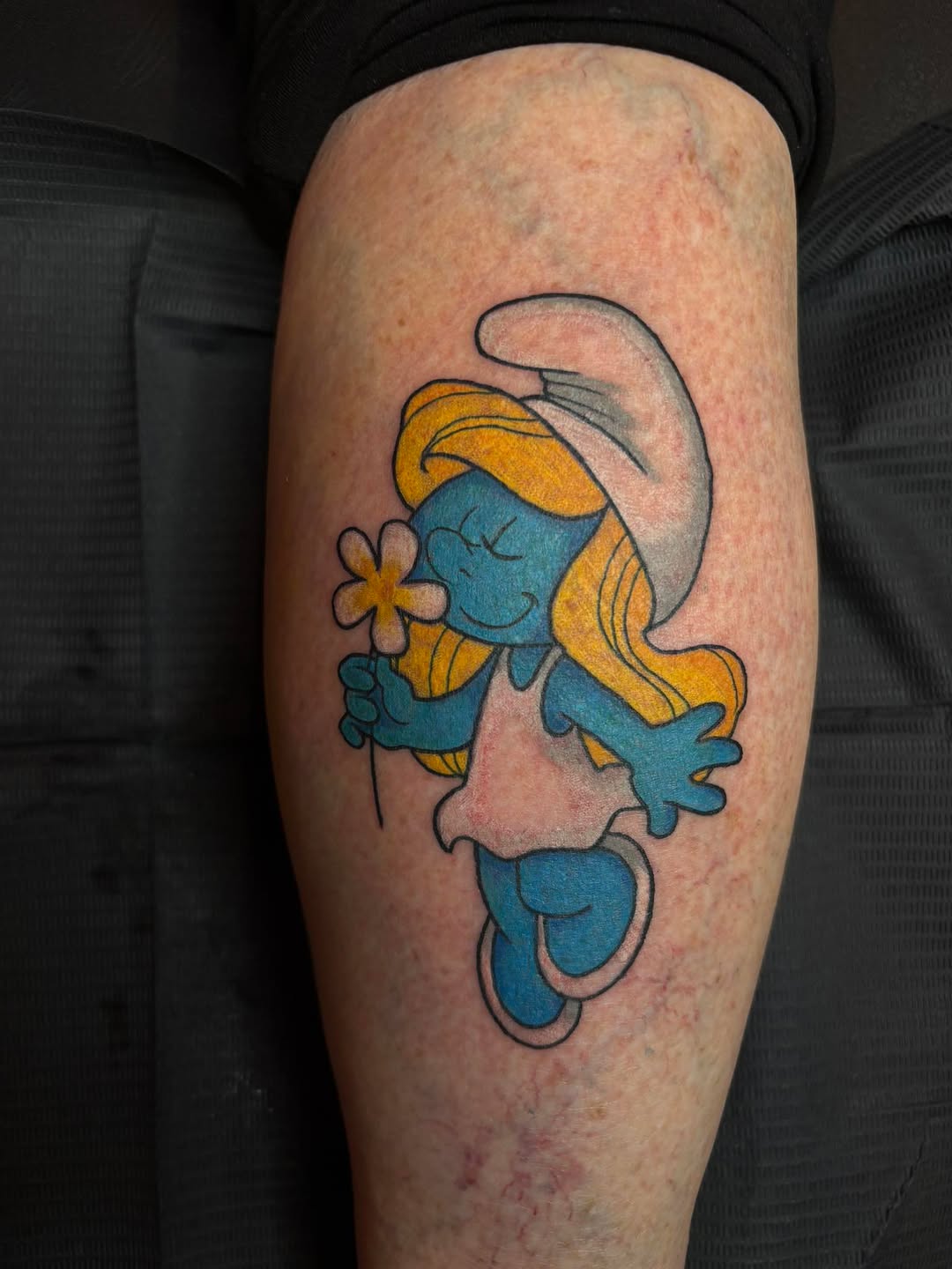 I got to do this adorable Smurfett tattoo today and it was so much fun! Bring me all of the cartoon color tattoos.