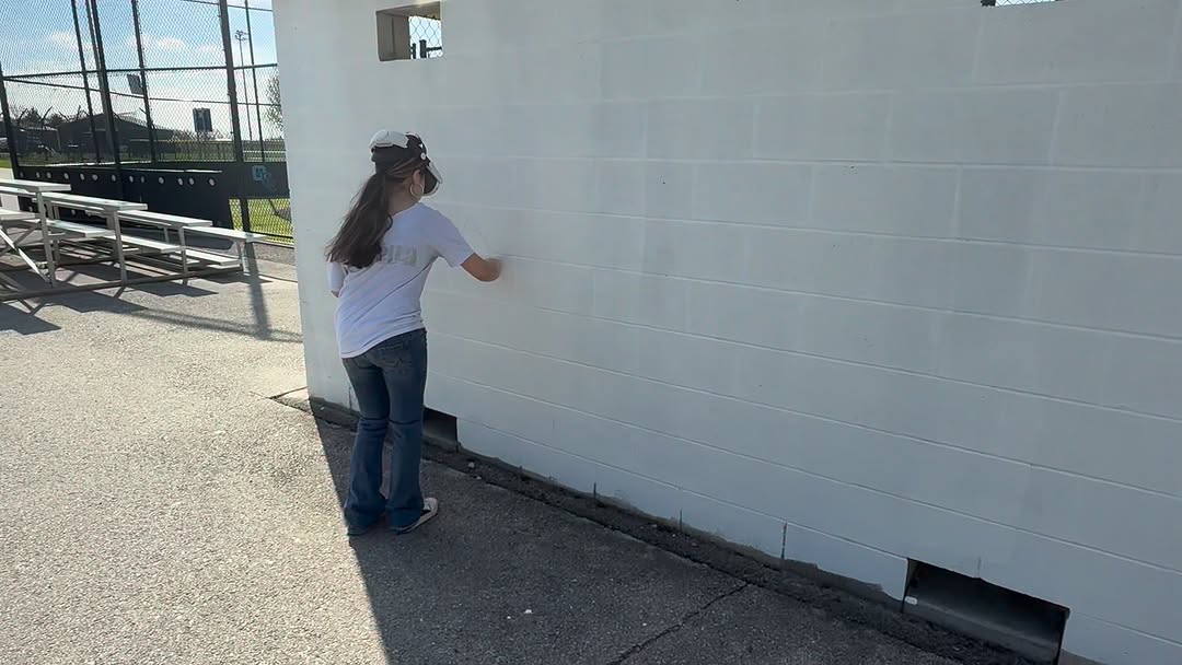 Working alongside an intern from Toledo School for the Arts, providing hands-on experience and explaining the process is key to how the next generatio
