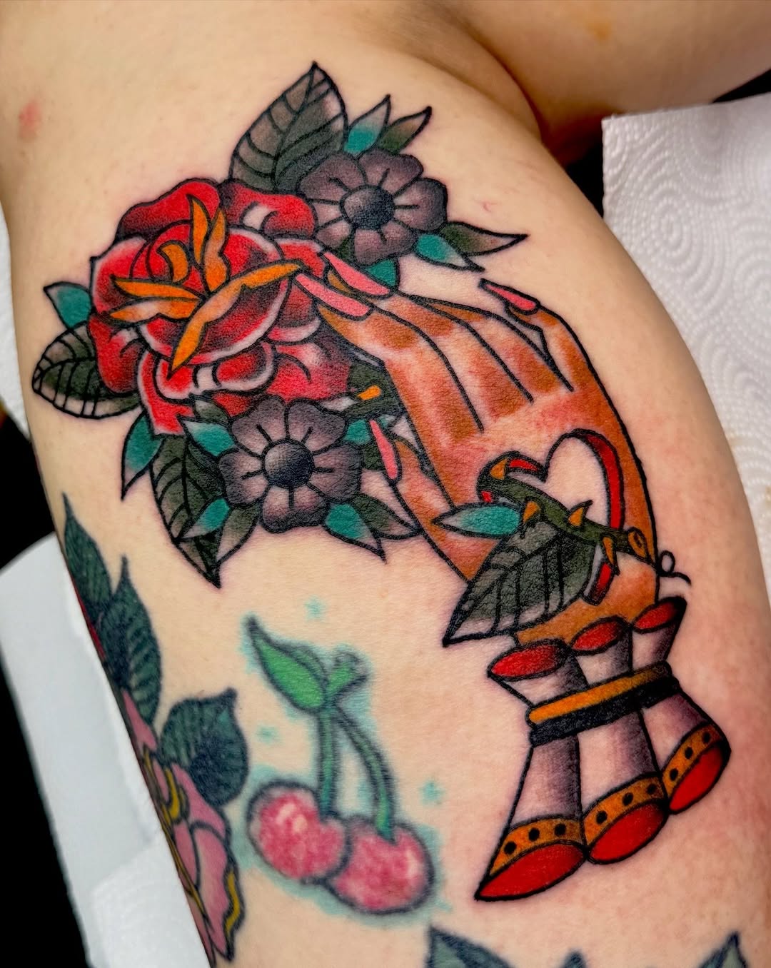 hand holding a floral bouquet off of my flash for Ashley yesterday! thank you so much for your trust and patience  surrounding tattoos not done by me
