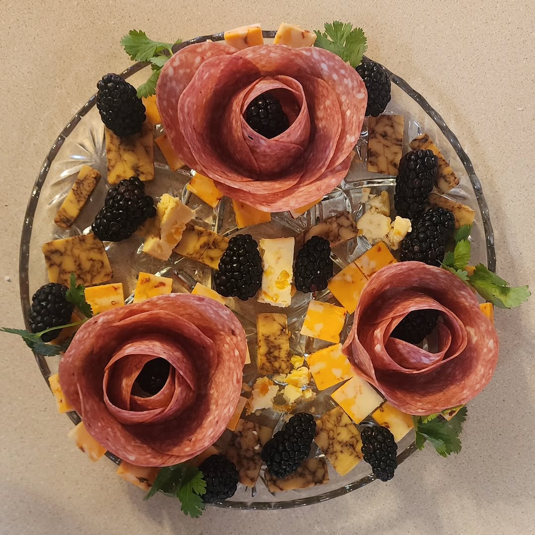 Shark coochie done with my oldest. <3 he did the roses. 
#sharkcoochieboard #charcuterie #xmastime #wisconsincheese