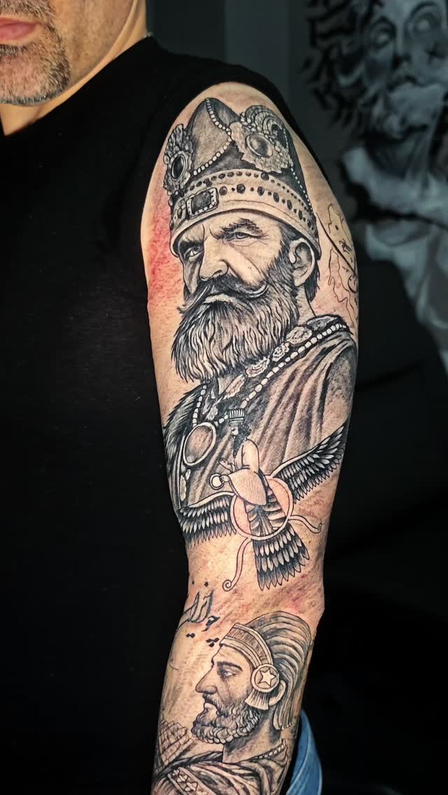 @ahuraink 
This full-hand tattoo is inspired by Persian history and heritage.
On the upper arm, the portrait of Nader Shah the Great is depicted.
Belo