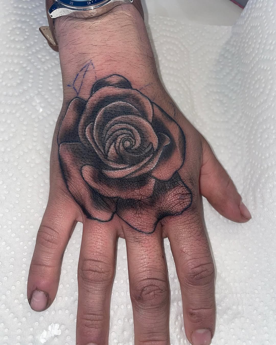 Little rose banger #hands #tattoo #floral #michigan #michigantattoos #michigantattooartist  #rose #fortheloveofart #eternalink #dynamic #bishoprotary 
