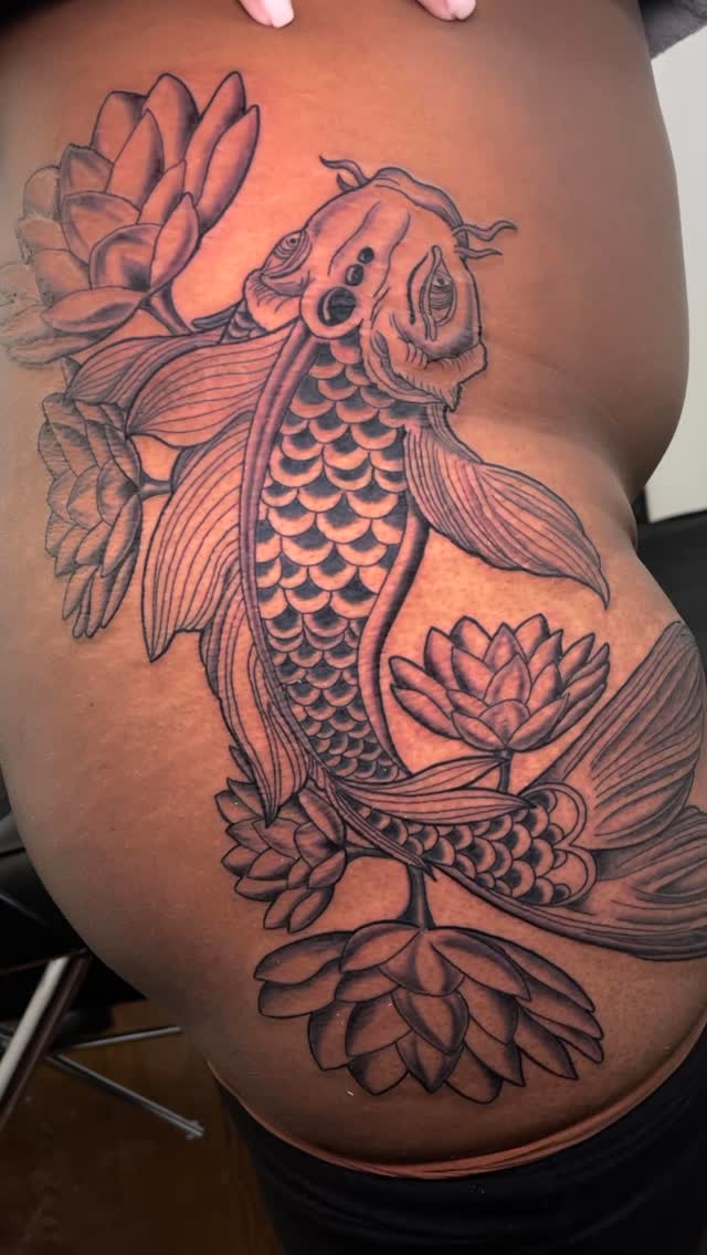 K O I  F I S H
Got to do this koi fish and lily flower tattoo for a client wanting to get something symbolizing her overcoming adversity going against