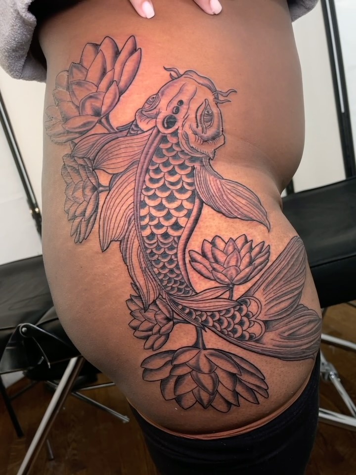 K O I  F I S H
Got to do this koi fish and lily flower tattoo for a client wanting to get something symbolizing her overcoming adversity going against