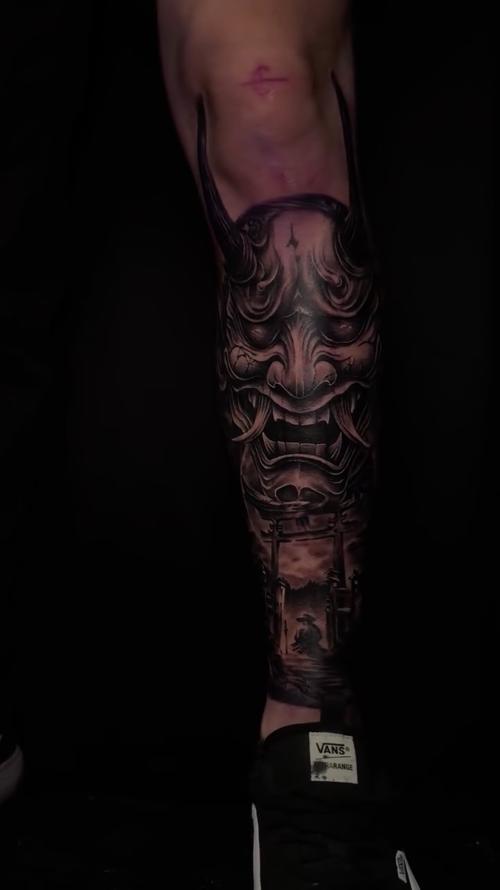 Embrace the power and mystery of Japanese folklore with this intricately designed Oni mask tattoo. Symbolizing protection, strength, and the balance b