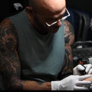 Amos Nadjar עמוס נג׳ר - Soundwave tattoo artist in null, Israel