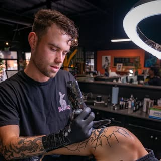 Austin Clark | Sacramento Tattoo Artist - Soundwave tattoo artist in Sacramento, United States