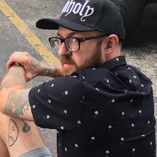 Brass Monkey Tattoo Co - Soundwave tattoo artist in Toledo, United States