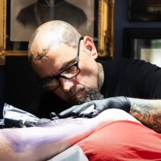 Chad Polidore - Soundwave tattoo artist in Fayetteville, United States