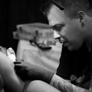 Charles Tattoo & Art - Soundwave tattoo artist in Las Vegas, United States