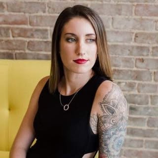 Claire Schneider| Tattoo Artist Springfield MO - Soundwave tattoo artist in Springfield, United States