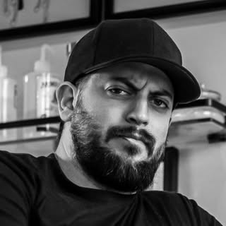 Dan Collins Rose Tattoo - Soundwave tattoo artist in San Diego, United States