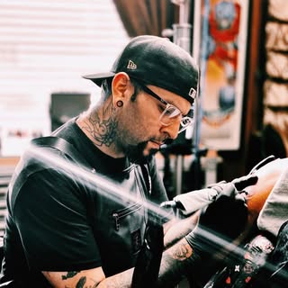 Danny Pando - Soundwave tattoo artist in Dallas, United States