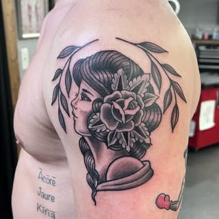 Deja Vu Tattoo and Piercing - Soundwave tattoo artist in Winston-Salem, United States