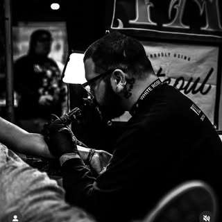 EDDIE WOLFE | TATTOO ARTIST Chicago - Soundwave tattoo artist in Chicago, United States