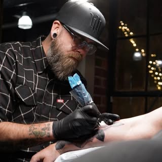 Evolutionary Studios - Soundwave tattoo artist in Hendersonville, United States
