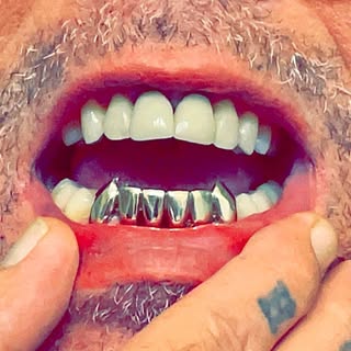 House of Pain Tattoo's and Piercing's - Soundwave tattoo artist in Byram, United States